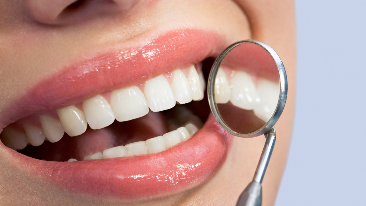 Patient smiling confidently after completing orthodontic teeth straightening treatment at Orthoworx Sydney