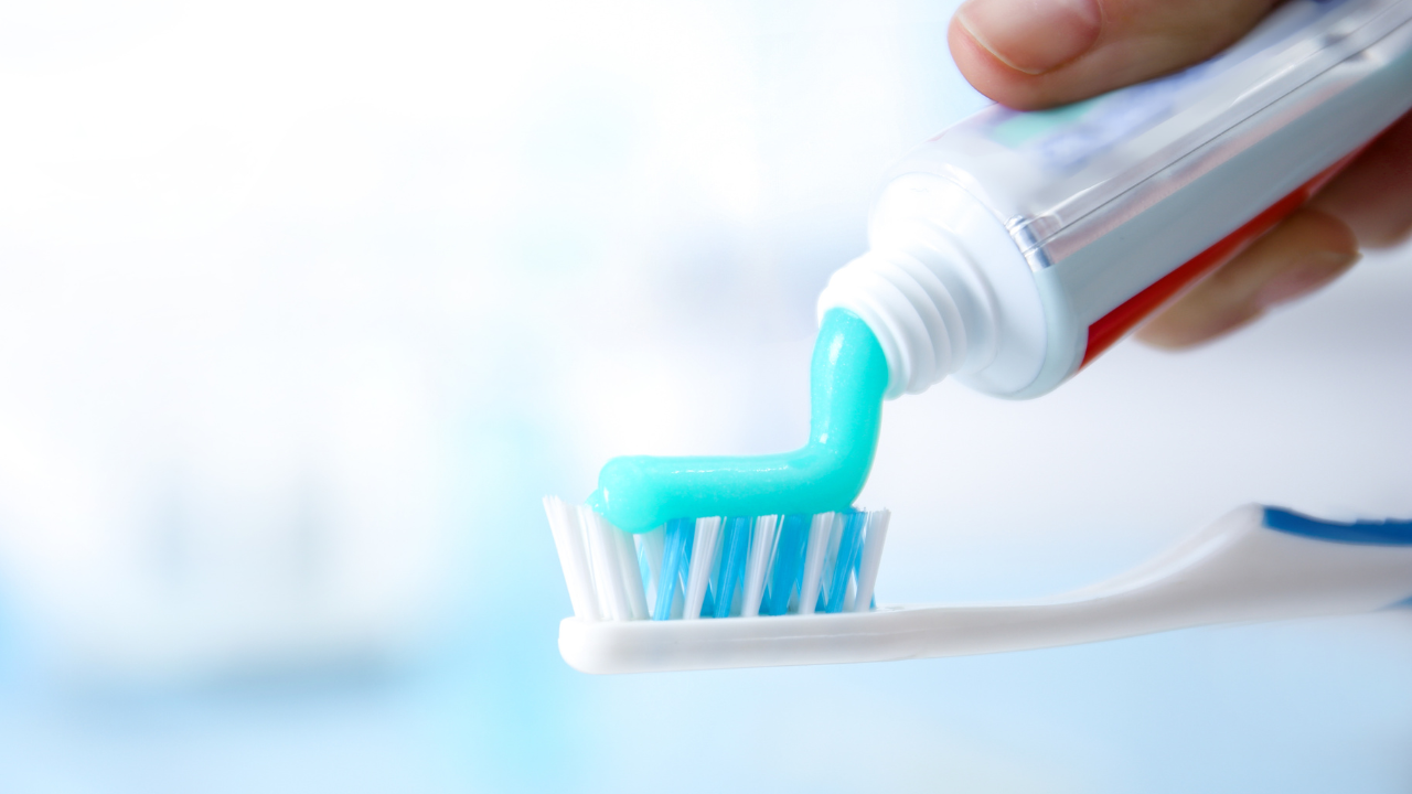 Illustration showing four types of fluoride treatment — varnish, gel, mouth rinse, and toothpaste — with their application methods